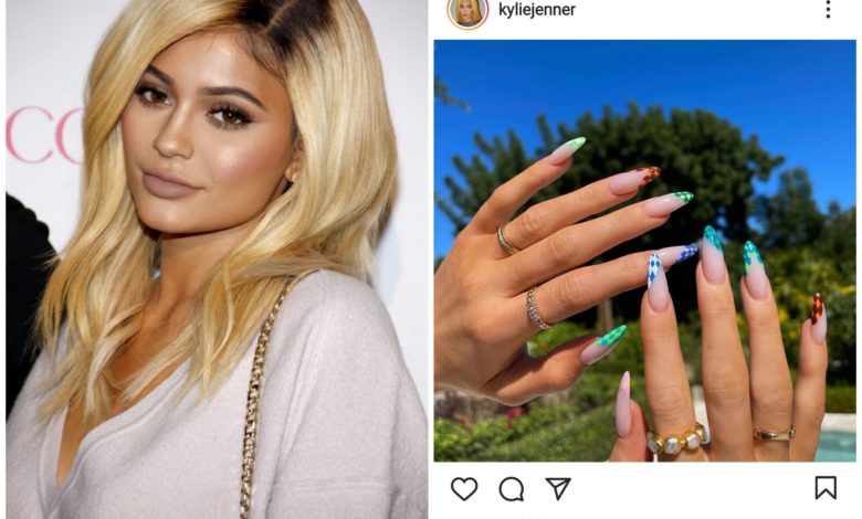 Kylie Jenner posses her funky nail art